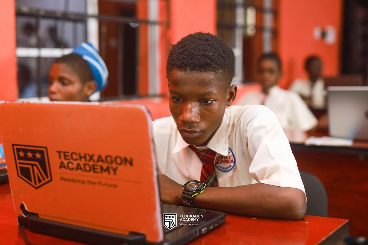 Student building a robotics project at Techxagon Academy